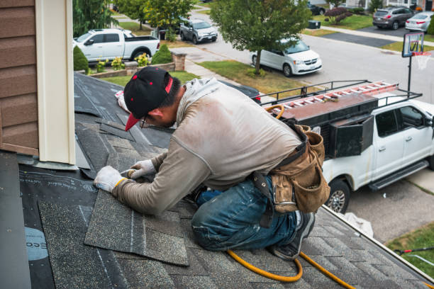 Professional Roofing technician working in Arena, WI